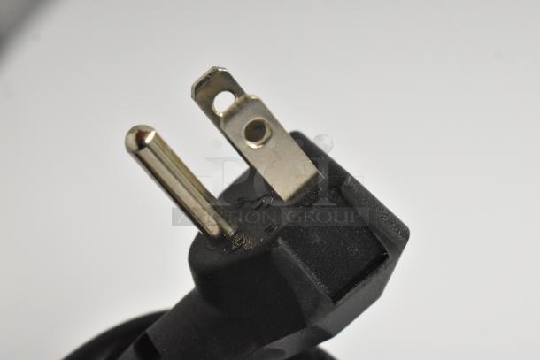 Power plug for Danby DCF100A6WM Chest Freezer, 115 Volts, 1 Phase. Close-up view of a three-prong electrical plug.