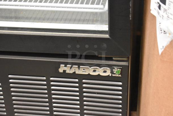 2019 Habco SE18 metal commercial single door cooler with poly-coated racks, visible Habco logo, 115 volts, 1 phase.
