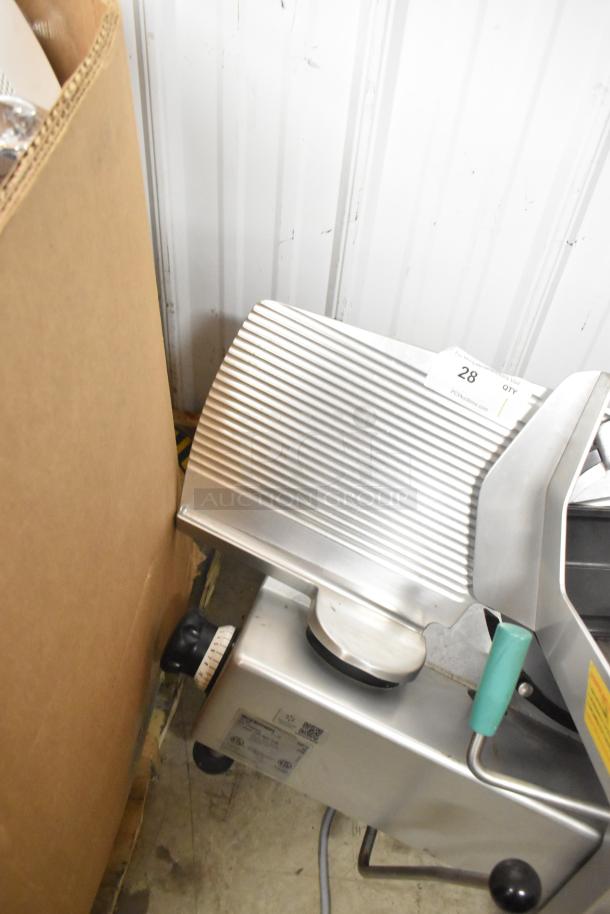Bizerba metal countertop meat slicer, commercial grade, 120V, 1 phase, excellent condition, auction tag visible.