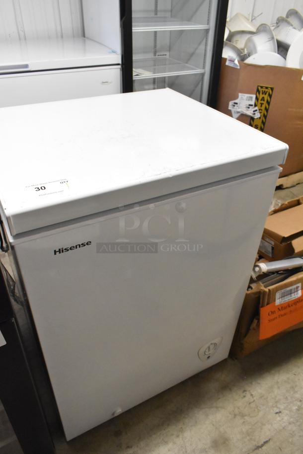 Hisense WFC050M6XWD chest freezer, 115 volts, one phase, clean white exterior, minor surface marks, brand label visible.