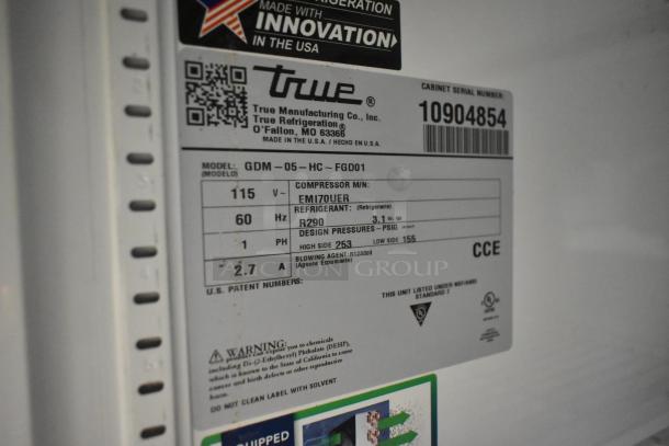 Label of 2024 True GDM-05-HC mini cooler, 115 volts, 1 phase, model number and specifications visible.
