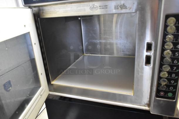 2018 Menumaster MRC30S2 stainless steel commercial microwave oven, open door, keypad, 208/240V, clean interior.