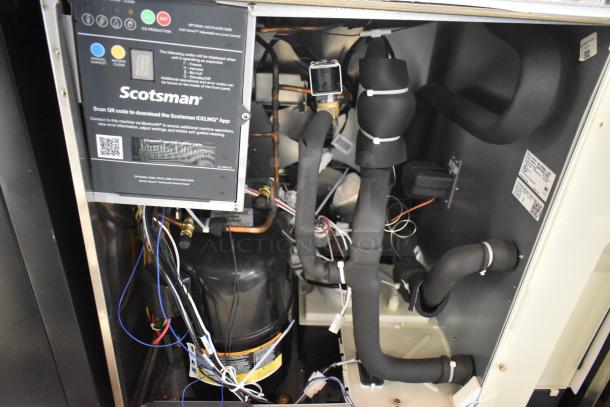2024 Scotsman MC1030MA-32A ice machine interior, showing wiring, components, QR code for Scotsman ICELINQ® app.