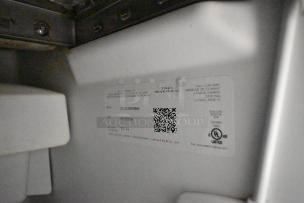 General Electric Monogram ZDIS15SSHRHA stainless steel ice machine label showing model details and certifications.