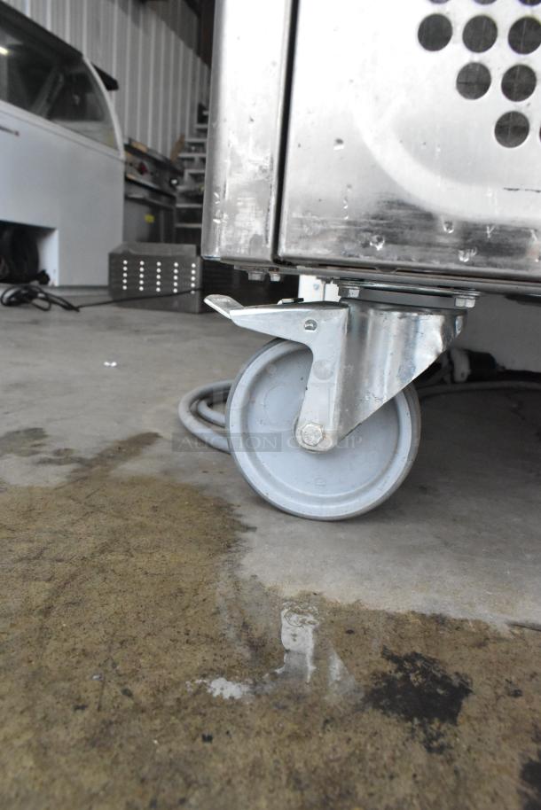 2023 Desmon GBF-15+ETL Stainless Steel Blast Chiller on casters, close-up view of caster wheel.