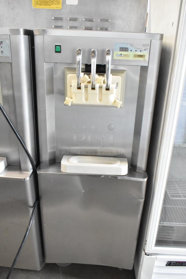 BQ333 stainless steel soft serve ice cream machine, 2 flavor with twist. Commercial casters, 110V, 1 phase, model BQ333.
