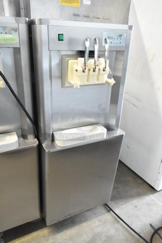 BQ333 Stainless Steel Commercial Floor Style 2 Flavor w/ Twist Soft Serve Ice Cream Machine on Commercial Casters. 110 Volts, 1 Phase. - Item #1214864
