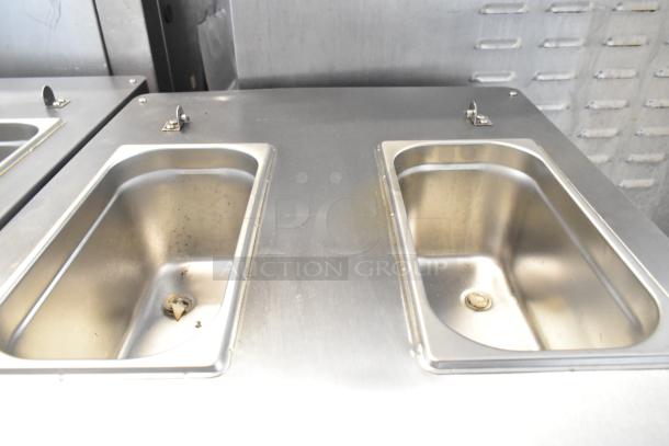 BQ333 stainless steel commercial soft serve ice cream machine with dual flavor and twist feature, model BQ333, on casters.