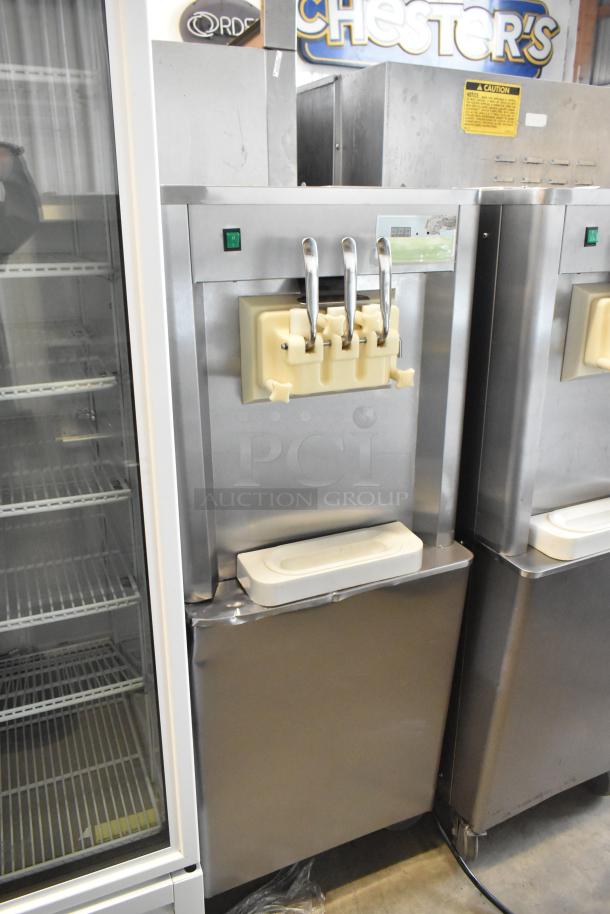 BQ333 stainless steel soft serve ice cream machine, floor style, 2 flavor with twist, on casters, 110 volts, 1 phase.