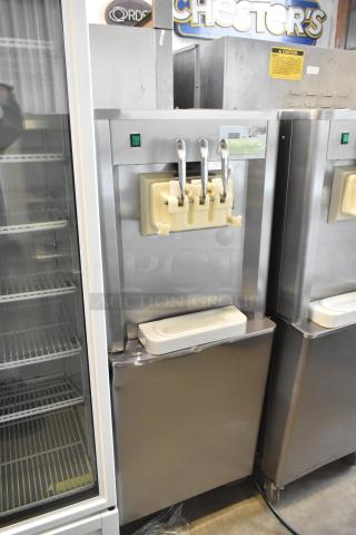 BQ333 Stainless Steel Commercial Floor Style 2 Flavor w/ Twist Soft Serve Ice Cream Machine on Commercial Casters. 110 Volts, 1 Phase. - Item #1214865