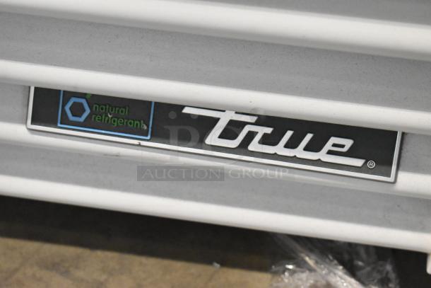 True TSCI-600R-G-PH cooler merchandiser label, featuring "natural refrigerant" and brand logo.