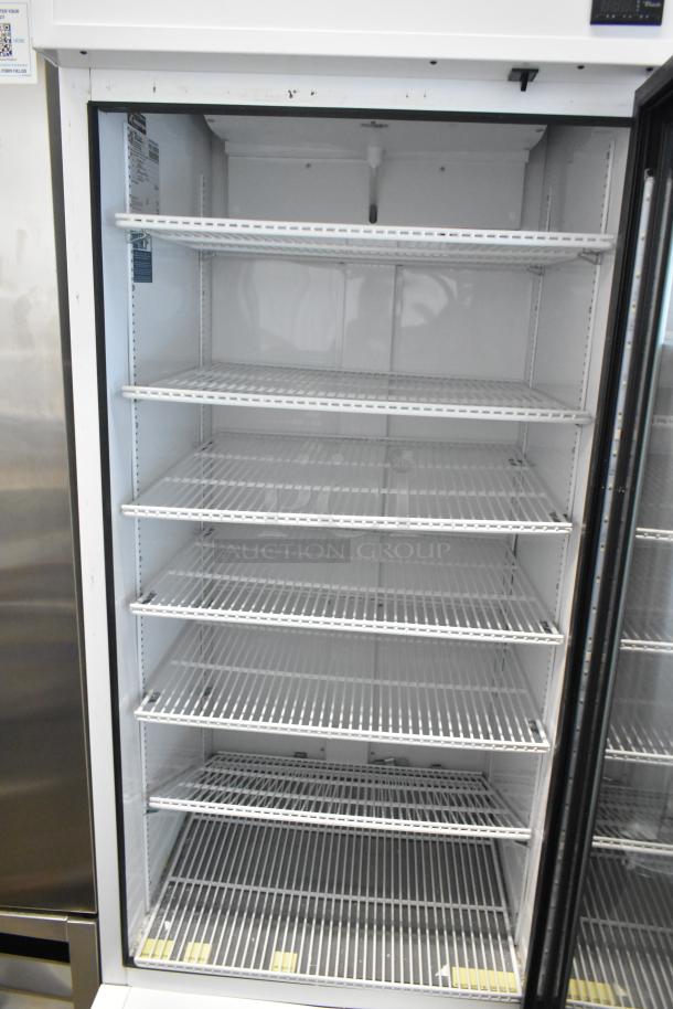 2021 True TSCI-600R-G-PH commercial single door cooler with poly coated racks, 115V, 1 phase, well-maintained.