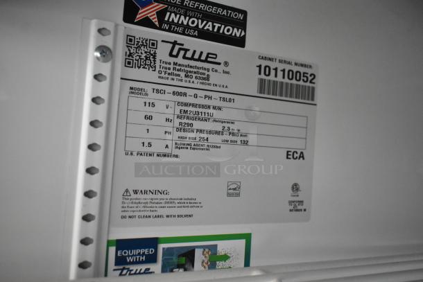 2021 True TSCI-600R-G-PH commercial cooler label, showing voltage (115V), compressor model EM2U3111U, refrigerant R290.