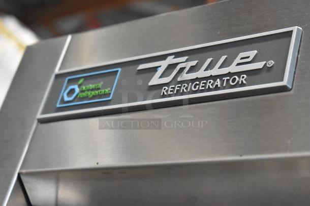2025 True T-35-HC stainless steel cooler, 2 doors, poly coated racks, natural refrigerant label, excellent condition.