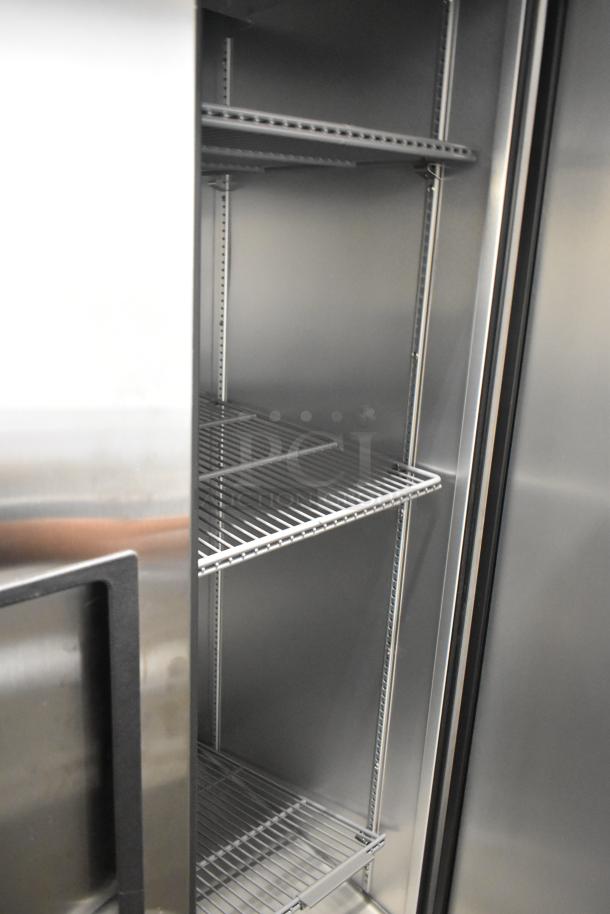 2025 True T-35-HC stainless steel 2-door reach-in cooler with poly coated racks, 115V, 1 phase, excellent condition.