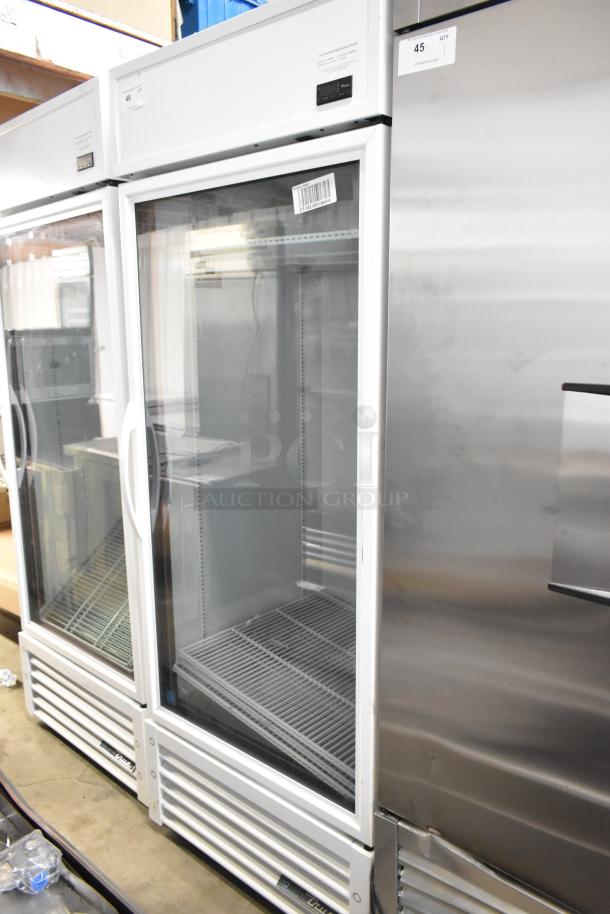 2021 True TSCI-600R-G-PH commercial single door cooler, glass front, poly coated racks, 115V, excellent condition.