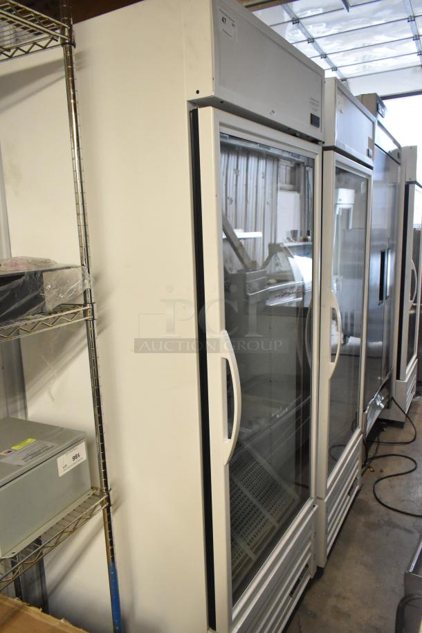 2021 True TSCI-600R-G-PH single door cooler merchandiser, metal build, glass door, poly-coated racks, 115V.