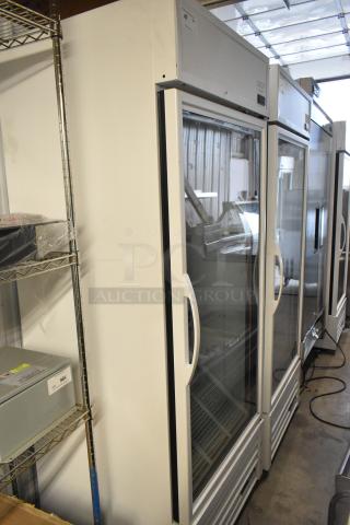 2021 True TSCI-600R-G-PH single door cooler merchandiser, metal build, glass door, poly-coated racks, 115V.