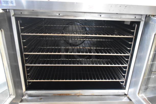 Blodgett stainless steel commercial convection oven with view-through doors, five racks, and thermostatic controls.