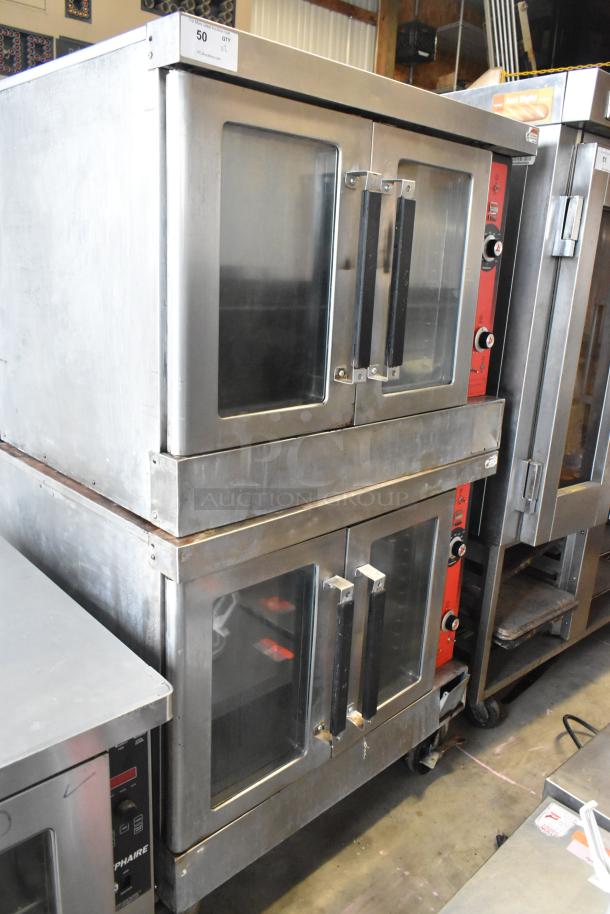Stainless steel commercial full-size convection oven pair with view-through doors, thermostatic controls, and casters.