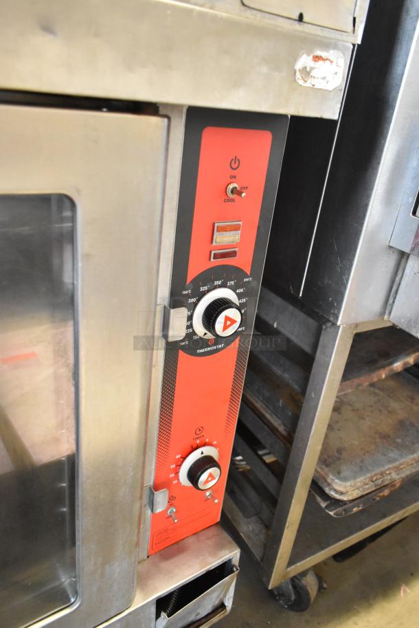 Stainless steel commercial convection oven with view-through door, thermostatic controls, and commercial casters.