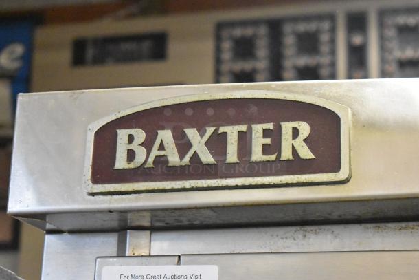 Baxter stainless steel electric mini rotating rack oven, commercial use, on double pan rack. Features Baxter brand logo.