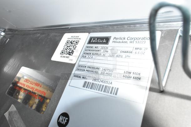 Perlick DDS36 beer dispenser label showing model, refrigerant, power supply details, barcode, and NSF certification.
