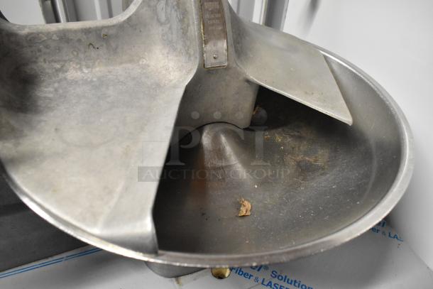 Hobart 84185 Buffalo Chopper, metal, visible wear, 115 volts, 1 phase, tag indicates rotating knife instructions.