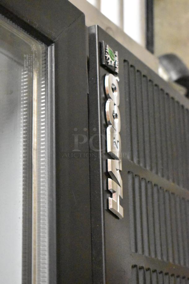 Habco SE12HC commercial cooler, metal single-door with poly-coated racks. 115V, 1 phase. Close-up of logo and door detail.