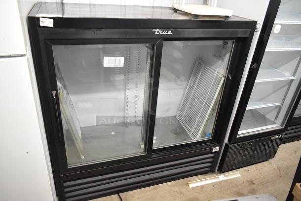 2018 True GDM-41SL-48-HC-LD 2 Door Metal Reach-In Cooler with poly coated racks, 115V, 1 phase, good condition.