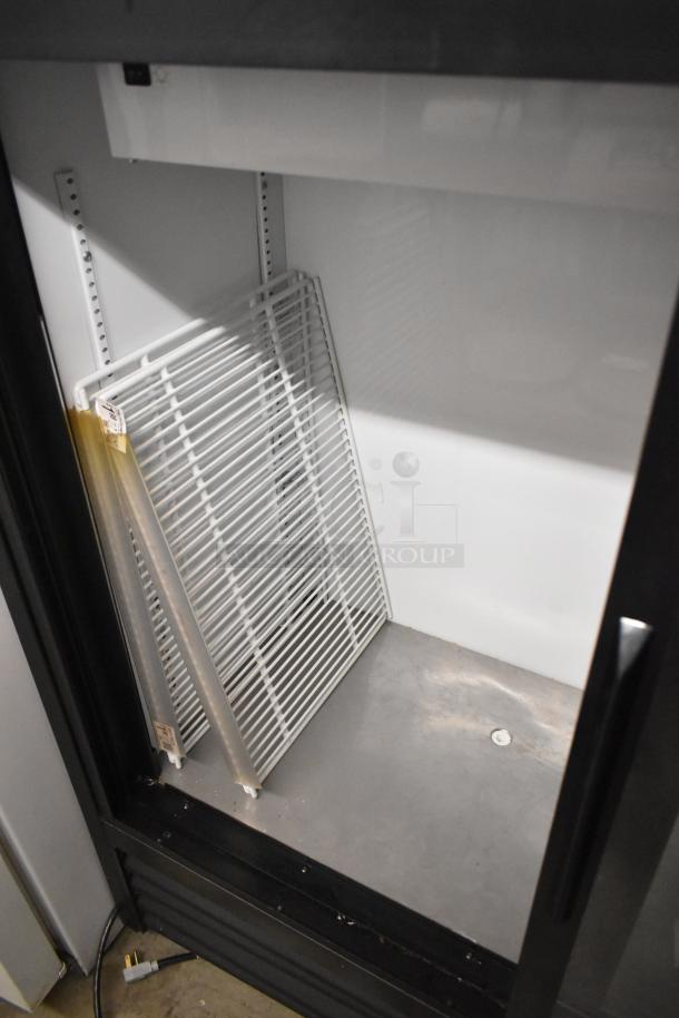 2018 True GDM-41SL-48-HC-LD 2-door reach-in cooler, poly-coated racks, 115V, excellent condition.