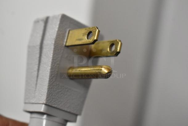 Close-up of a power plug for the 2018 True GDM-41SL-48-HC-LD commercial cooler. 115 volts, 1 phase.