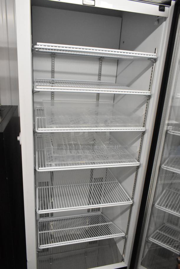 2019 Habco SE18HC single door cooler merchandiser, poly coated racks, metal finish, 115V, 1 phase. Excellent condition.