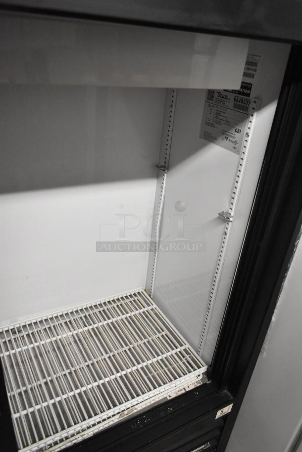 2018 True GDM-41SL-48-HC-LD 2 Door Cooler, metal, poly coated racks, tags visible with True logo and model info.