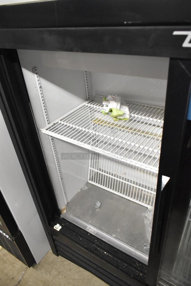 2018 True GDM-41SL-48-HC-LD 2-door cooler, metal frame, poly-coated racks, 115V, 1 phase. Interior view shows shelving.