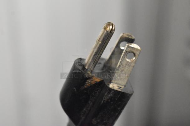 Close-up of a plug for the SPM Frosty 2 New Stainless Steel Slushie Machine. 115 Volts, 1 Phase.