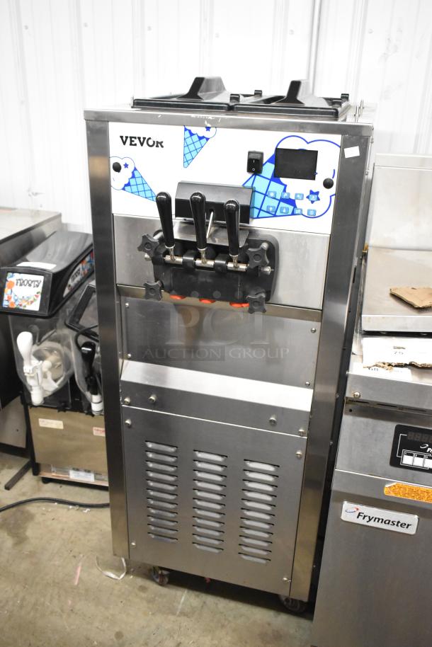Vevor SS240 stainless steel soft serve ice cream machine, 2-flavor with twist, on casters, 220V, 1 phase, good condition.