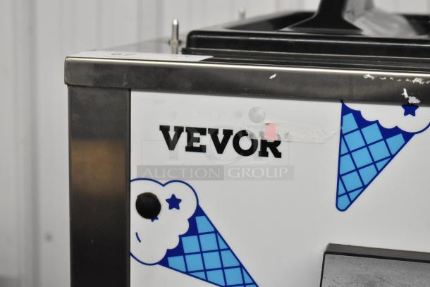 Vevor SS240 stainless steel soft serve ice cream machine, 2 flavors with twist, on commercial casters, 220V, 1 phase. Visible wear.