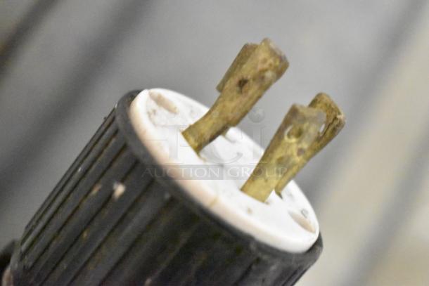 Close-up of the plug of a stainless steel commercial soft serve ice cream machine, 208/240V, 3 phase.