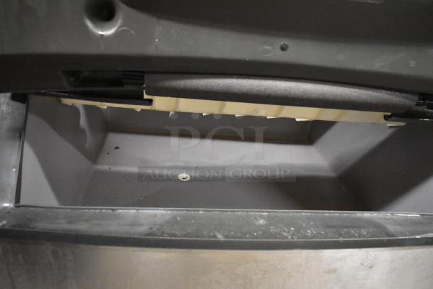 Manitowoc QD0282A stainless steel ice head on S170 ice bin, commercial use, 115V, 1 phase; interior view shows condition.