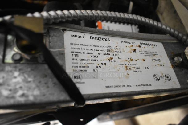 Manitowoc QD0282A stainless steel ice head on S170 bin, 115V, 1 phase. Features visible serial and model labels.