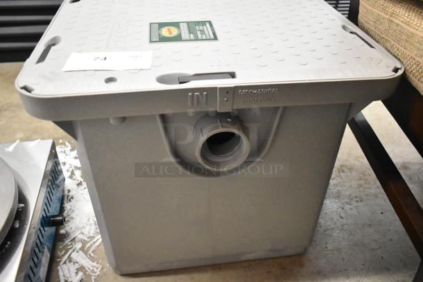 BRAND NEW SCRATCH AND DENT Endura 3925XTA02T 50 lb. 25 GPM grease trap, 2" threaded connections, visible markings.