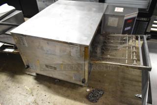 Lincoln Impinger 1961-Q stainless steel conveyor pizza oven, electric, 208 volts, 3 phase, commercial use, visible wear.