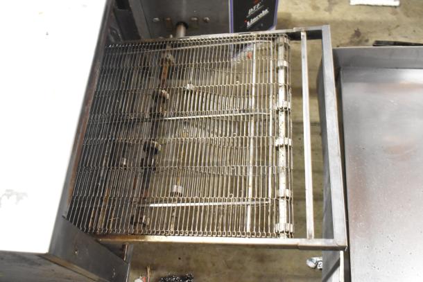 Lincoln Impinger 1961-Q stainless steel conveyor pizza oven, 208V, 3-phase, countertop model, visible wear, electric powered.