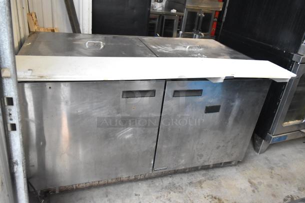 Delfield 4460N-24M-QZN stainless steel commercial prep table with lids, visible wear. 115V, 1 phase.