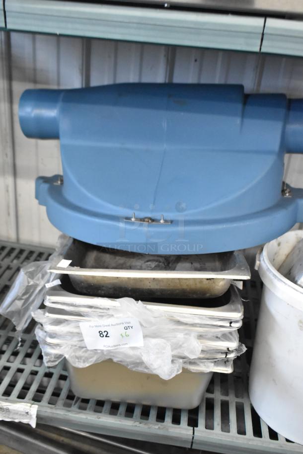 Six brand new scratch and dent stainless steel drop-in bins, wrapped, with auction label showing lot 82, quantity 6.