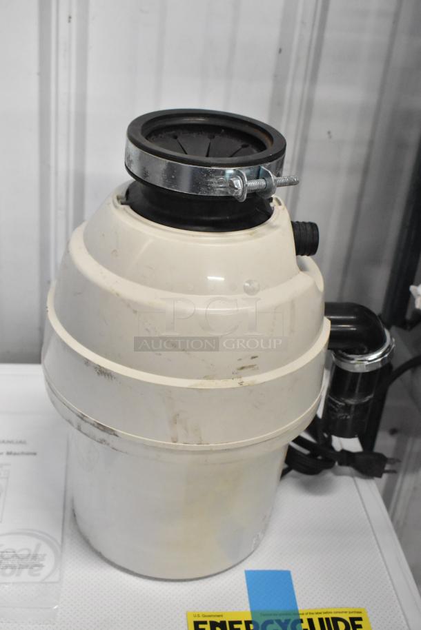 Franke unit, 115 volts, 1 phase. Cream color, visible wiring, slight wear. Auction includes 3 items per bid.