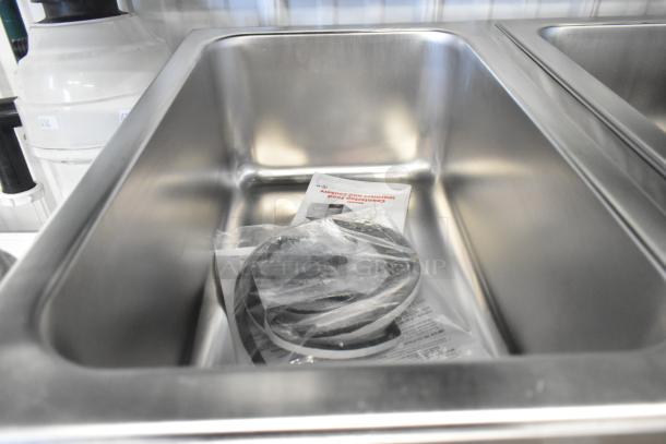 BRAND NEW ServIt 423FW200D stainless steel 12"x20" dual well food warmer with digital controls, 120V, minor scratches.