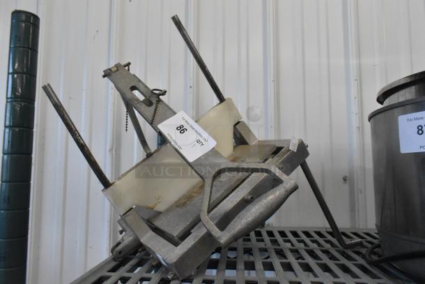 Lincoln Redco metal countertop lettuce cutter, shows signs of use, label number 86 visible, sturdy metal construction.