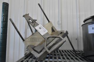 Lincoln Redco metal countertop lettuce cutter, shows signs of use, label number 86 visible, sturdy metal construction.